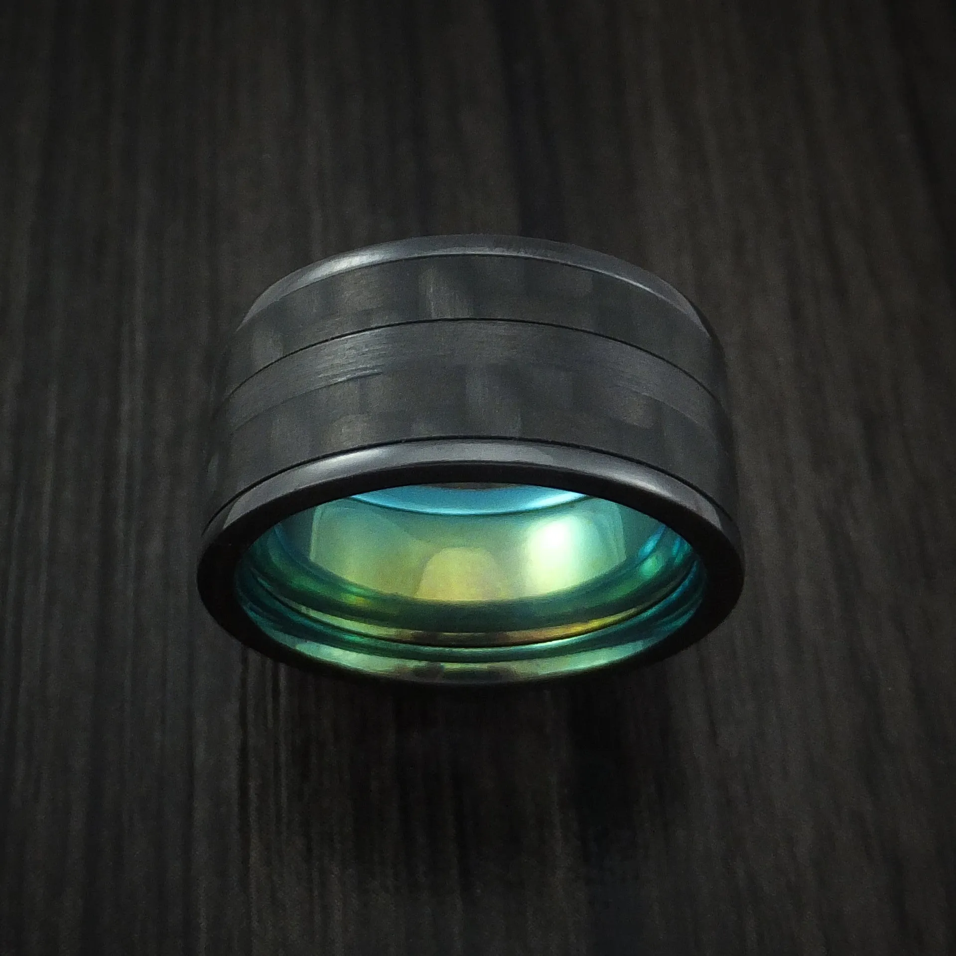 Black Titanium Men's Ring with Black Carbon Fiber Inlay and Green Anodized Sleeve Custom Made Band