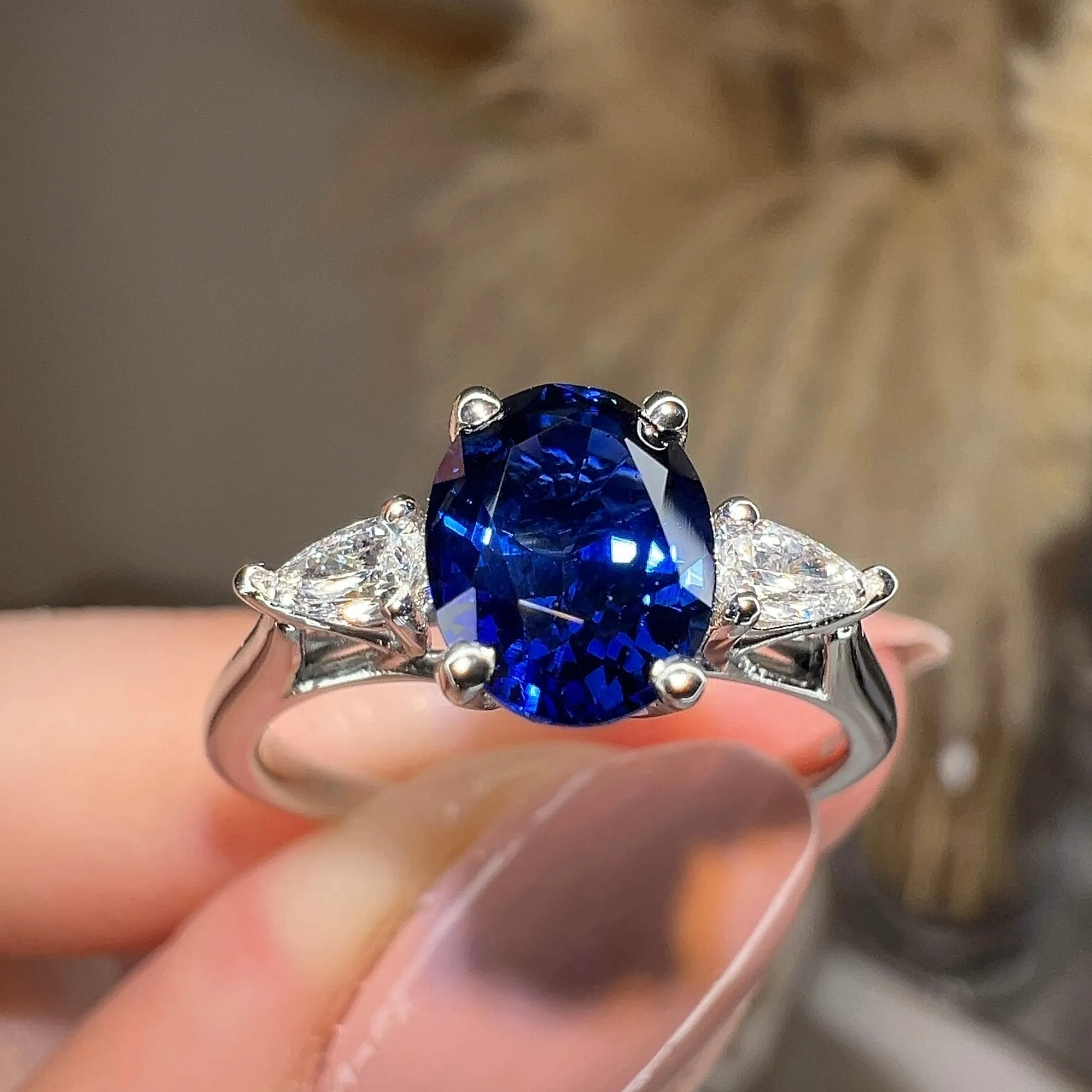 "Gwen" Trilogy 2 Carat Oval Cut Blue Sapphire Pear Shoulders Platinum Engagement Ring